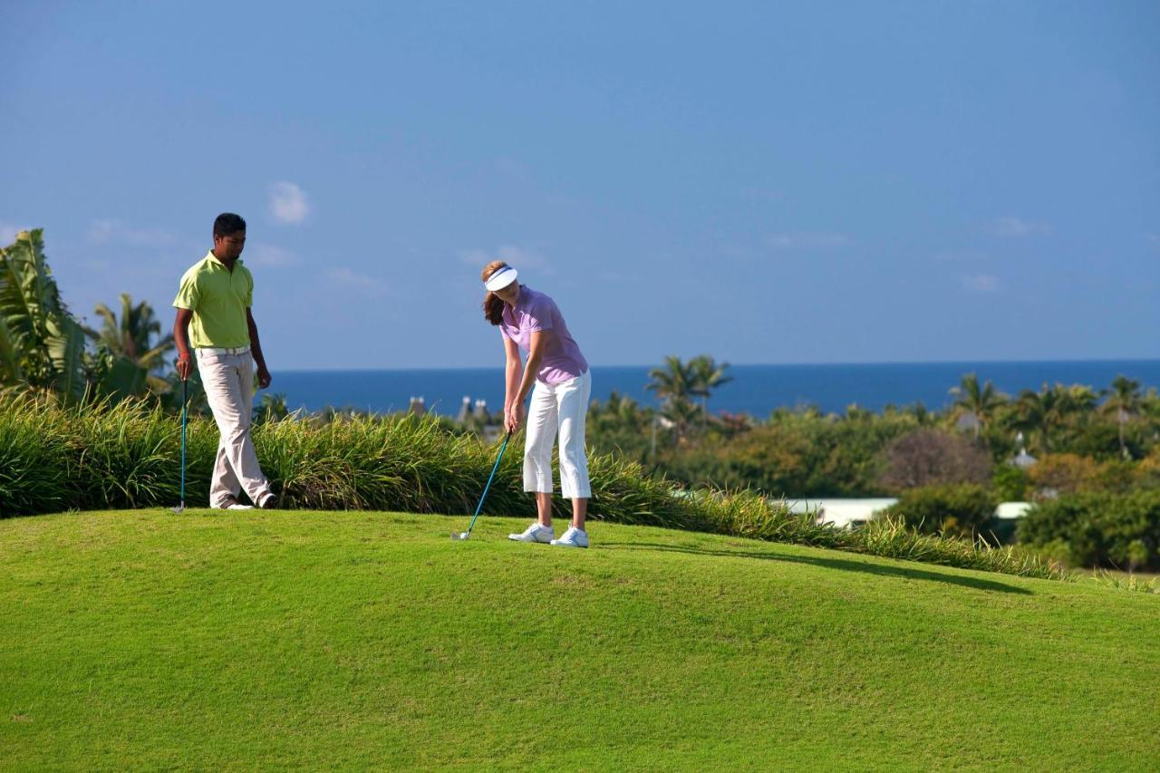 Heritage Le Telfair Golf & Wellness Resort Bel Ombre Exterior photo Golfers at the Four Seasons Resort