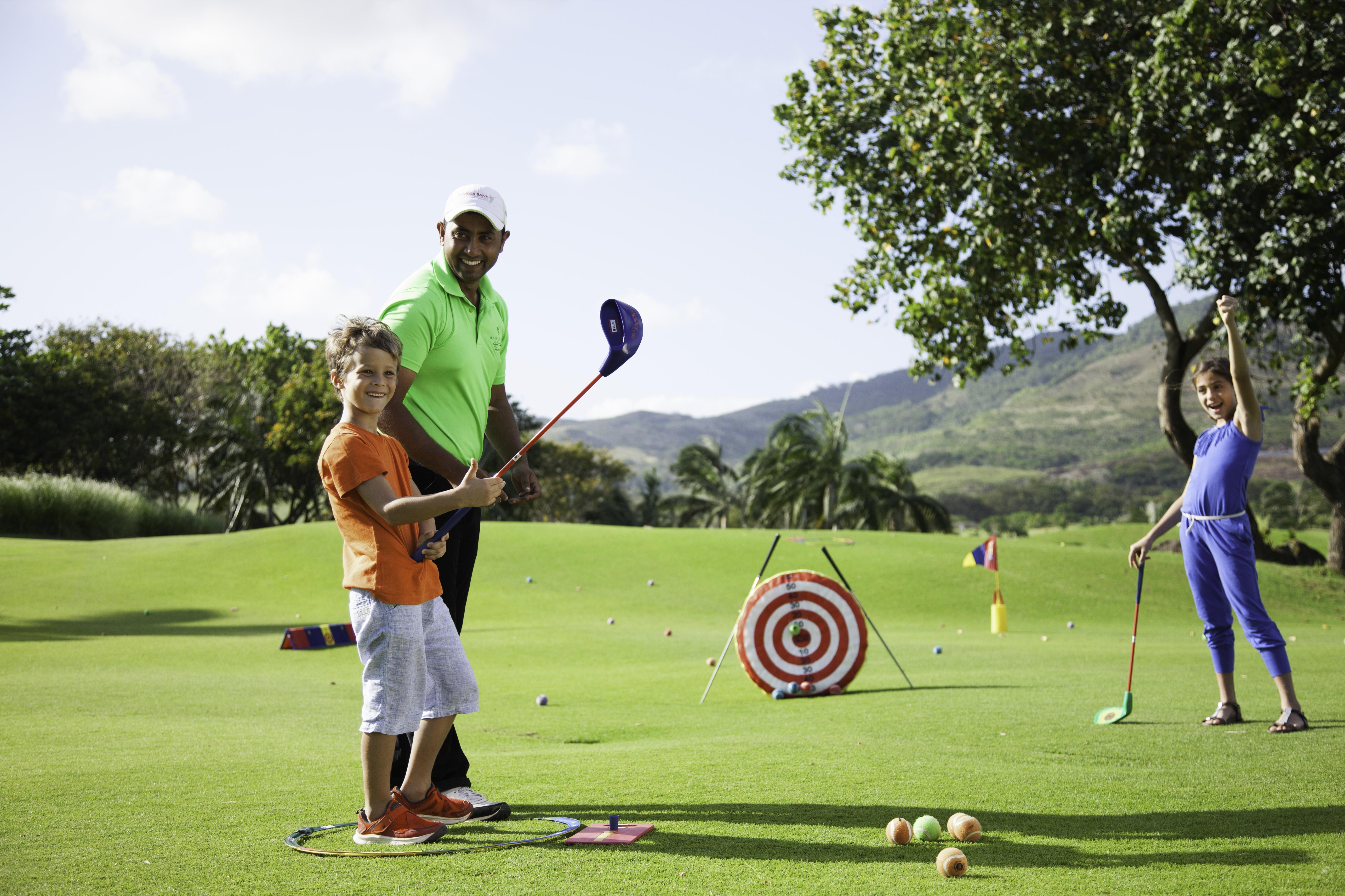 Heritage Le Telfair Golf & Wellness Resort Bel Ombre Exterior photo Tiger Woods with his children